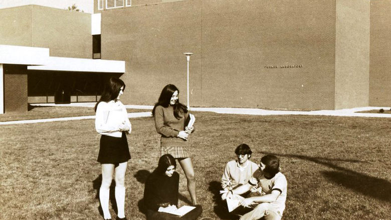 Four students in front of Forker Laboratory Building