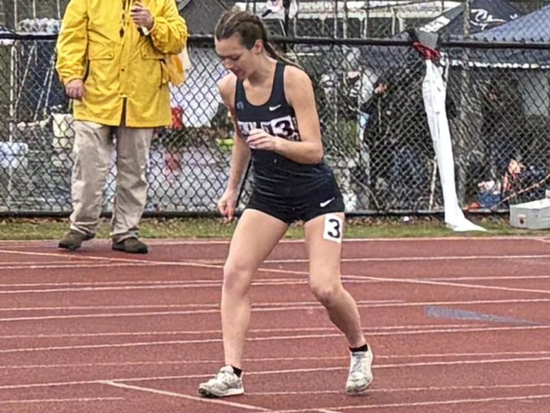 Faith Sullivan at the starting line on a track before a race