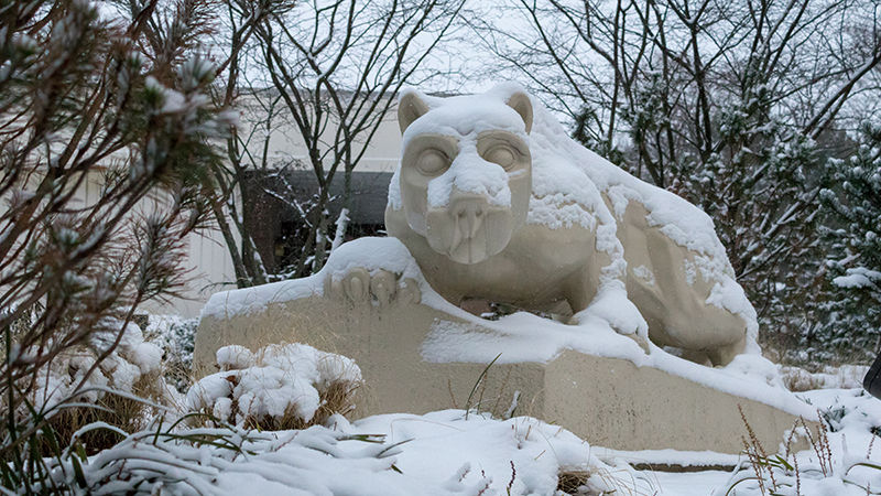 The Lion Shrine, covered in several inches of snow, on a gloomy winter day