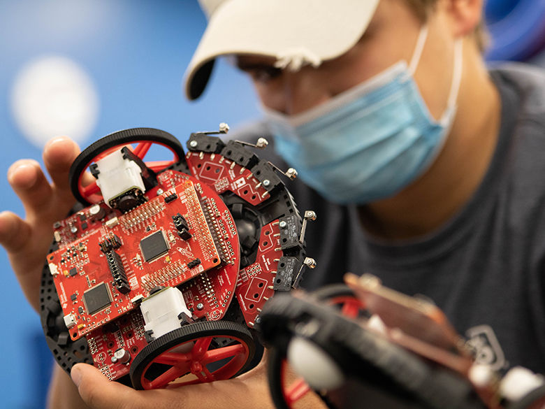 Penn State Shenango student working on robot
