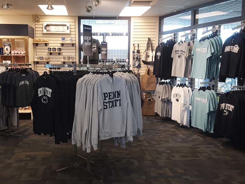 Bookstore with Penn State sweatshirts on clothing racks