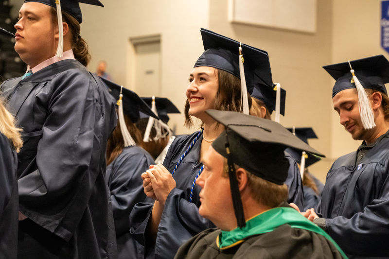 Penn State graduates celebrating commencement at the Fayette Campus.