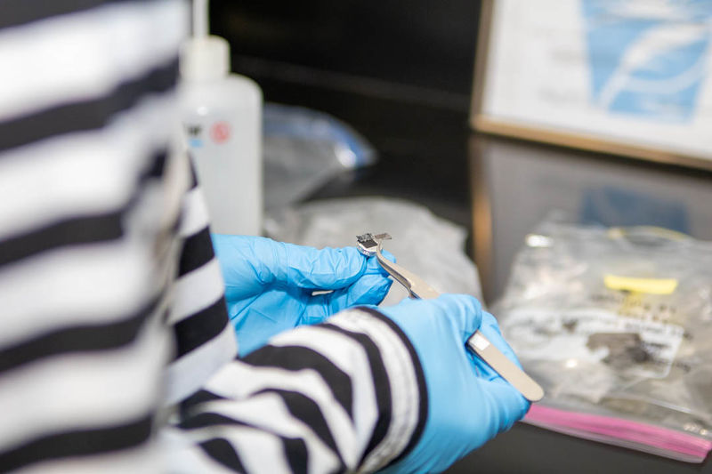 Student prepares mask sample for SEM 