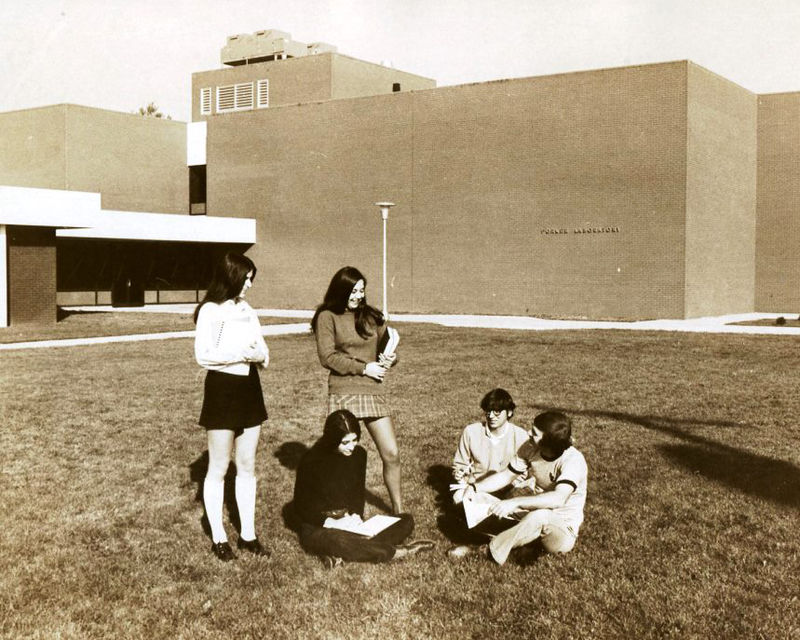 Four students in front of Forker Laboratory Building