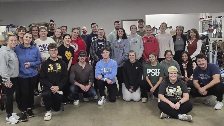 Group photo of Penn State Shenango students with medical equipment