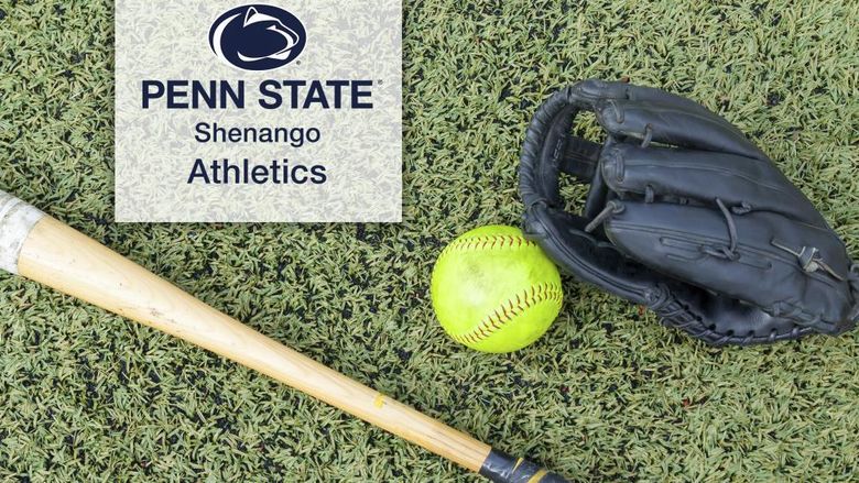 Green softball laying on a turf field next to a black glove and bat with the Penn State Shenango Athletics logo overlayed on a white background