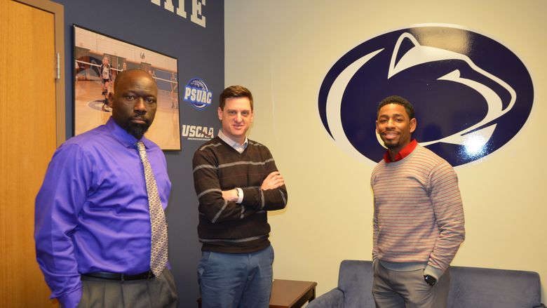 Three men standing in a Shenango campus office following a meeting about athletics.