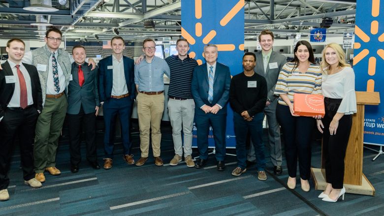 Penn State President Barron standing with student competitors of the 2019 Inc.U Competition