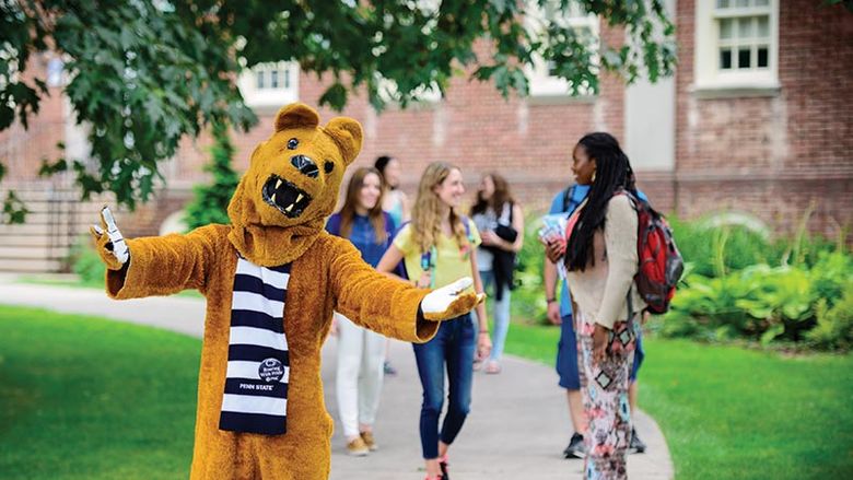 Nittany Lion Mascot with group of students