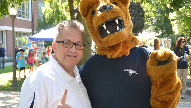Featured Alumnus Sam Bernstine with the Nittany Lion