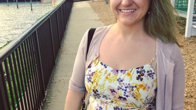Mandy Stingis standing on a boardwalk.