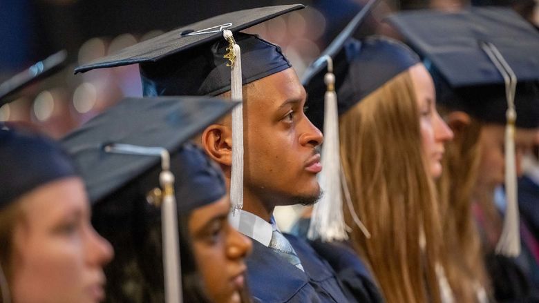 Students listen to a speaker during Penn State Behrend's spring commencement program.