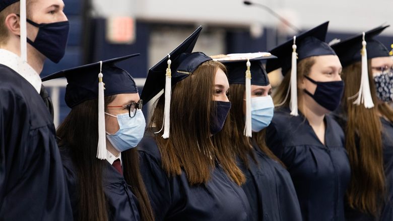 Graduates pose for photo