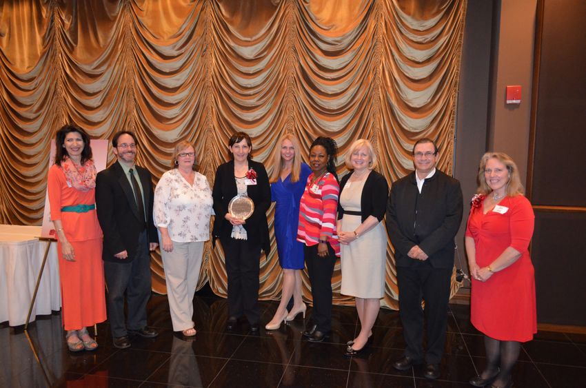 Shenango faculty and staff pose with CCC's Fern Torok (far right) at this year's annual dinner.