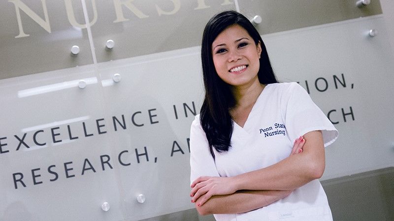 Picture of a woman in scrubs