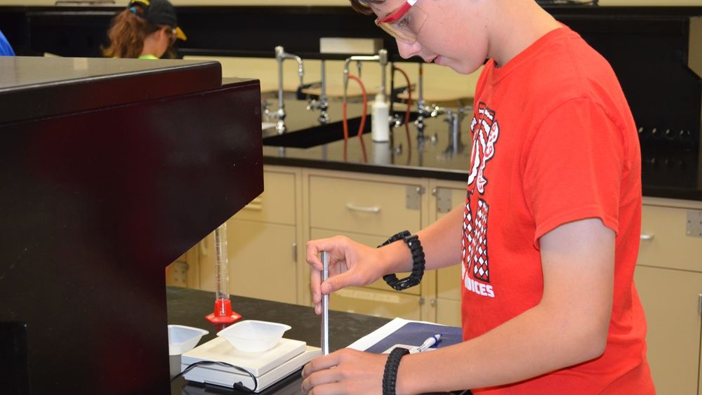 Student working on a project in Penn State Shenango's laboratory