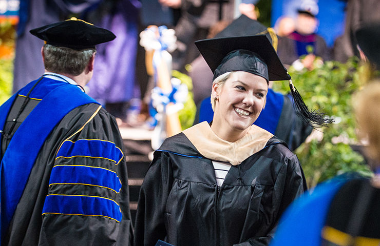 Female graduate of a Behrend master's degree program