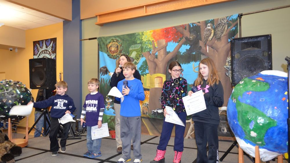 Students on stage at Shenango campus during Earth Fest 2016