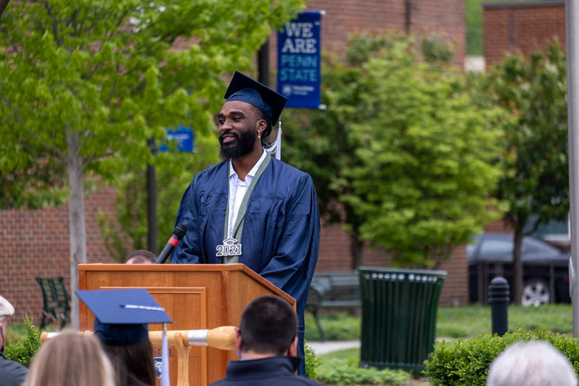 Donovan Verges speaking at podium at commencement 