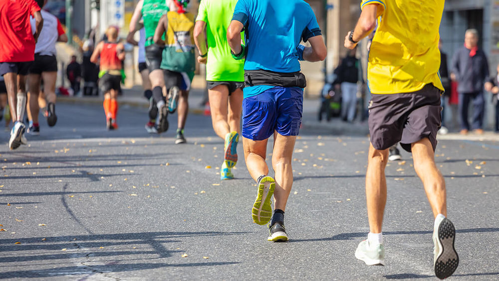 View of runners on a road during a race