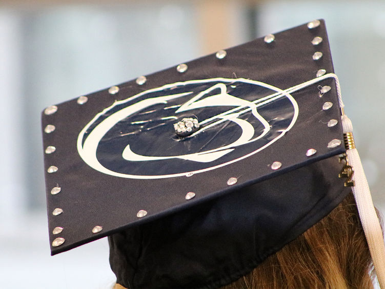 Blue graduation cap with Penn State Nittany Lion logo