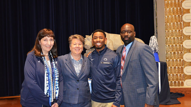 Penn State administrators pose for a picture at the Shenango Alumni Society Tailgate event on April 12